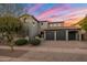 A charming two-story home with a well-manicured yard and a spacious two-car garage at 9412 E Hidden Spur Trl, Scottsdale, AZ 85255