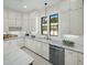 Gourmet kitchen with marble countertops, stainless appliances, and ample cabinet space at 9412 E Hidden Spur Trl, Scottsdale, AZ 85255
