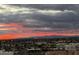 Expansive city view under a dramatic sunset sky, highlighting the urban landscape and horizon at 1 E Lexington Ave # 1210, Phoenix, AZ 85012