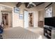 Relaxing main bedroom showcases neutral tones and offers access to a walk-in closet and ensuite bath at 1 E Lexington Ave # 1210, Phoenix, AZ 85012