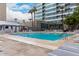 Inviting community pool with lounge chairs, cabana, and modern high rise backdrop at 1 E Lexington Ave # 1210, Phoenix, AZ 85012