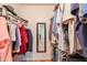 Well-organized walk-in closet providing ample storage space at 10461 W Loma Blanca Dr, Sun City, AZ 85351