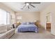 Spacious bedroom featuring natural light and comfy furniture at 10684 N 161St Ave, Surprise, AZ 85379