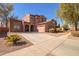 Beautiful two-story home with a tile roof, spacious driveway, and well-maintained landscaping at 10684 N 161St Ave, Surprise, AZ 85379