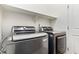 Laundry room featuring a pair of modern LG washer and dryer appliances at 10684 N 161St Ave, Surprise, AZ 85379