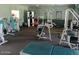 Sunland Spring's well-equipped gym features various weight machines and exercise equipment at 11530 E Monterey Ave, Mesa, AZ 85209