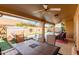 Covered patio with ceiling fans and a scenic view of the swimming pool at 11530 E Monterey Ave, Mesa, AZ 85209