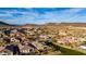 Scenic aerial view of a residential community nestled in a mountainous desert landscape, Arizona at 12413 W Calle De Baca --, Peoria, AZ 85383