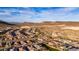 Panoramic aerial view of a vibrant community nestled in a desert landscape with mountain backdrops at 12413 W Calle De Baca --, Peoria, AZ 85383