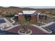 Aerial view of the contemporary clubhouse, showcasing its unique architectural design and inviting atmosphere at 12413 W Calle De Baca --, Peoria, AZ 85383