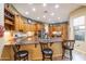 Spacious kitchen with granite countertops, custom cabinetry, and stainless steel appliances at 12835 W Black Hill Rd, Peoria, AZ 85383