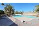 Attractive backyard with a refreshing pool, comfortable seating area, and meticulous landscaping, perfect for relaxation at 13232 W Ballad Dr, Sun City West, AZ 85375