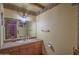 Bathroom featuring a large mirror and neutral-colored countertop at 14264 S Baniff Ln, Arizona City, AZ 85123