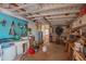 Garage space with sink, shelving and storage at 14264 S Baniff Ln, Arizona City, AZ 85123