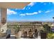 Balcony featuring potted cacti, a black metal railing, and mountain views at 14850 E Grandview Dr # 226, Fountain Hills, AZ 85268