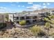 Beautiful multi-story home with multiple balconies and desert landscaping at 14850 E Grandview Dr # 226, Fountain Hills, AZ 85268