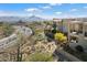 Scenic shot of a community of homes nestled near a road with desert landscaping at 14850 E Grandview Dr # 226, Fountain Hills, AZ 85268