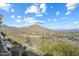 Mountain view from a balcony with desert landscaping and community features at 14850 E Grandview Dr # 226, Fountain Hills, AZ 85268