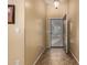 Inviting home entryway featuring tile floors, neutral walls, and a view to the outside at 16150 W Hope Dr, Surprise, AZ 85379