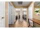 Hallway that offers seamless transitions between bedrooms with neutral wall and floor color at 16150 W Hope Dr, Surprise, AZ 85379