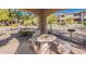 Charming gazebo features a stone table, benches, and grill for outdoor entertaining at 16420 N Thompson Peak Pkwy # 2120, Scottsdale, AZ 85260