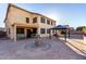 Spacious backyard with a gazebo, outdoor dining, and drought-resistant landscaping at 16528 W Pierce St, Goodyear, AZ 85338