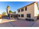 Expansive backyard featuring a gazebo with a dining set, complemented by desert landscaping at 16528 W Pierce St, Goodyear, AZ 85338