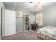 Light and airy bedroom featuring carpet flooring, ceiling fan, and a window at 16528 W Pierce St, Goodyear, AZ 85338