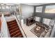 Open-concept living area with high ceilings and a staircase leading to the second level at 16528 W Pierce St, Goodyear, AZ 85338