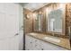 Bathroom featuring granite countertop, double sinks, and mosaic tile at 17217 E Calaveras Ave, Fountain Hills, AZ 85268