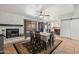 Cozy dining room features a stone fireplace and access to the outdoor patio at 17217 E Calaveras Ave, Fountain Hills, AZ 85268