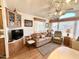 Inviting living room with a plush sofa, cozy chairs, decorative details, and a ceiling fan at 177 S Limestone Dr, Apache Junction, AZ 85119