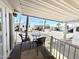 Relaxing covered patio area showcasing community views framed by sleek, black outdoor furniture at 177 S Limestone Dr, Apache Junction, AZ 85119