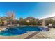 Backyard pool and hot tub combination perfect for outdoor entertainment and relaxation at 17793 W Corrine Dr, Surprise, AZ 85388