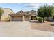 Charming two-story home with three-car garage and desert landscaping at 18118 W Golden Ln, Waddell, AZ 85355