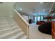 View from the staircase of the Basement, with projector screen and comfortable furnishings at 2251 N 32Nd St # 21, Mesa, AZ 85213