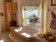 Luxurious bathroom with a soaking tub, decorative drapes, and natural light at 2251 N 32Nd St # 21, Mesa, AZ 85213