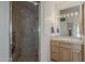 Bathroom featuring a walk-in shower with a bench and single vanity at 2251 N 32Nd St # 21, Mesa, AZ 85213