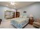 View of the bedroom with a bed, mirrored closet, and comfortable furnishings at 2251 N 32Nd St # 21, Mesa, AZ 85213