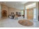 Gracious foyer with neutral colored walls, high ceilings, and tile flooring leading into an elegant living space at 2251 N 32Nd St # 21, Mesa, AZ 85213