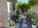 Picturesque garden featuring stone pathways, lush plants, and a serene outdoor space at 2251 N 32Nd St # 21, Mesa, AZ 85213