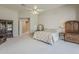 Large main bedroom featuring neutral walls, carpet, and classic furnishings at 2251 N 32Nd St # 21, Mesa, AZ 85213