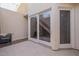 View of the patio area featuring a modern staircase and exterior access at 2251 N 32Nd St # 21, Mesa, AZ 85213