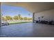 Expansive covered patio area leading to a well-manicured lawn and outdoor pool at 2251 N 32Nd St # 21, Mesa, AZ 85213