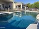 Sparkling fenced pool with stairs and view of the house and backyard at 2251 N 32Nd St # 21, Mesa, AZ 85213