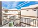 Balcony view of a residential apartment building under bright blue sky at 231 W Portland St, Phoenix, AZ 85003