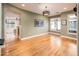 Open living room and kitchen floor plan with hardwood floors and natural light at 231 W Portland St, Phoenix, AZ 85003