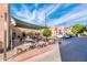 Outdoor seating area with brick patio and shade awnings at 231 W Portland St, Phoenix, AZ 85003