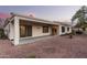 Covered patio area with ample space for outdoor living and relaxation at 23116 N Padaro Ct, Sun City West, AZ 85375