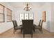 Dining room with modern lighting and seating at 23116 N Padaro Ct, Sun City West, AZ 85375